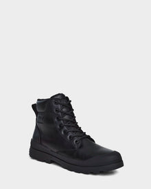 The Rudsak ARTUR - M223501 Black is a men's ankle boot with weather-treated leather, rugged rubber sole, metal eyelets, and reinforced stitching, shown at a slight angle on a plain light gray background.