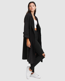 Oversized-wool-coat-black-side_60f39a7a-e4d3-4c82-b071-852356172516.jpg