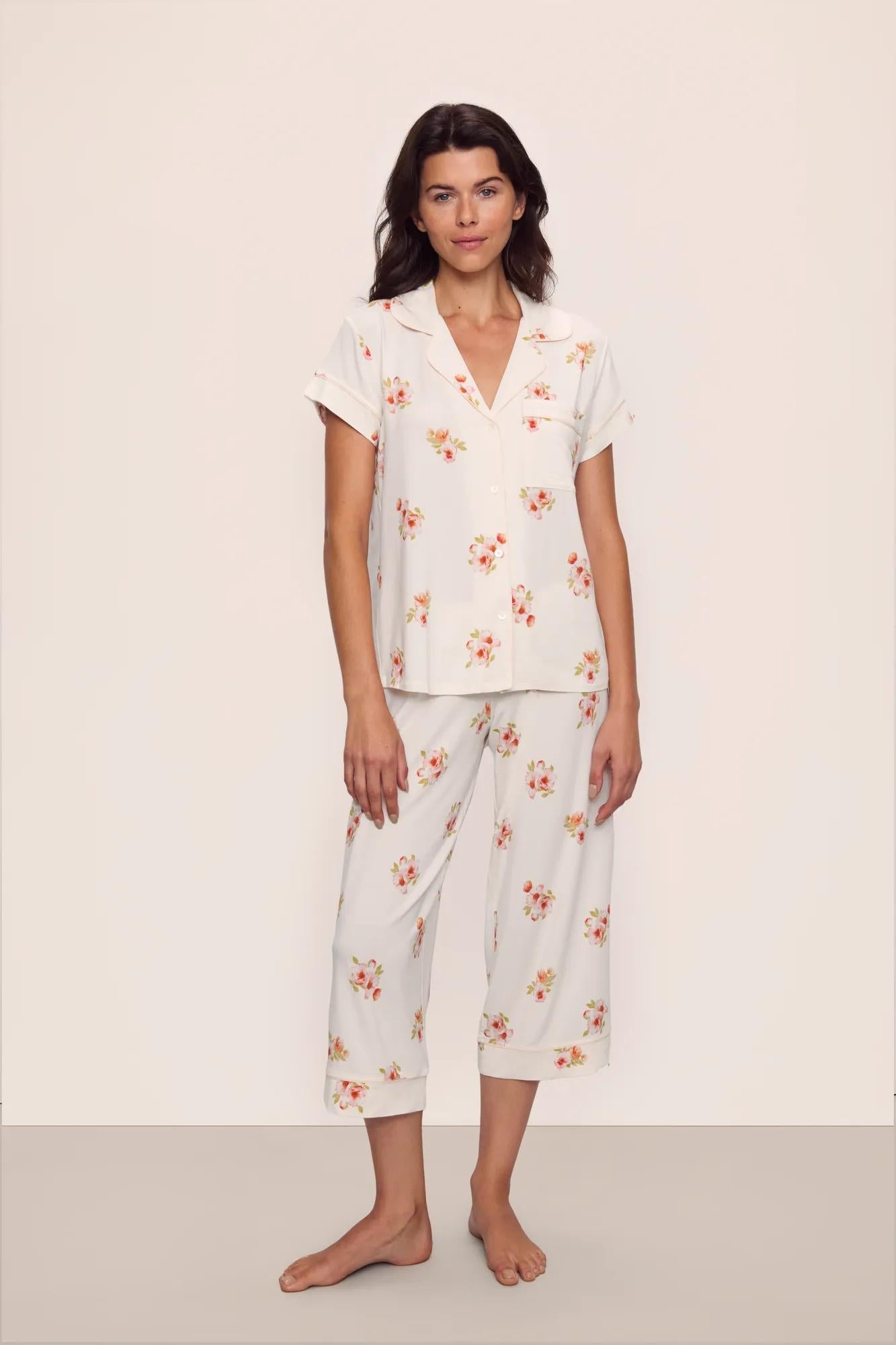 Model is wearing Gisele Printed TENCEL Modal Short Sleeve Cropped PJ Set in  Floral Bloom Ivy/Vanilla Cream