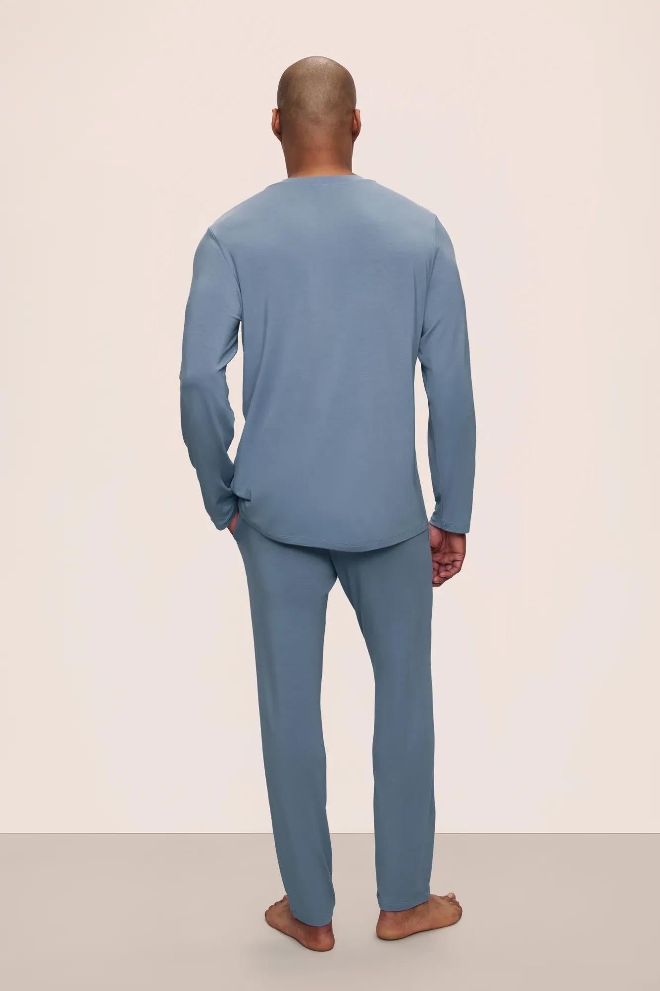 Model is wearing Henry TENCEL Modal Long Sleeve Crew PJ Set in Faded Denim