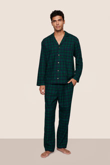 Model is wearing Men's Flannel Long PJ Set  in Black Watch Tartan Rainforest/Navy