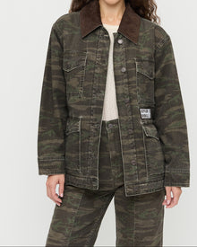 Quincy Jacket in dark camo denim, Molly Workwear Jean in dark camo denim, and Lolo Pointelle Long-Sleeve Top in cream pointelle.
