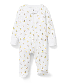 The Baby's Pima Romper in Tres Chick is a white, long-sleeve onesie with a yellow duckling print, footed bottoms, folded cuffs, and a zipper running from the collar to one leg.