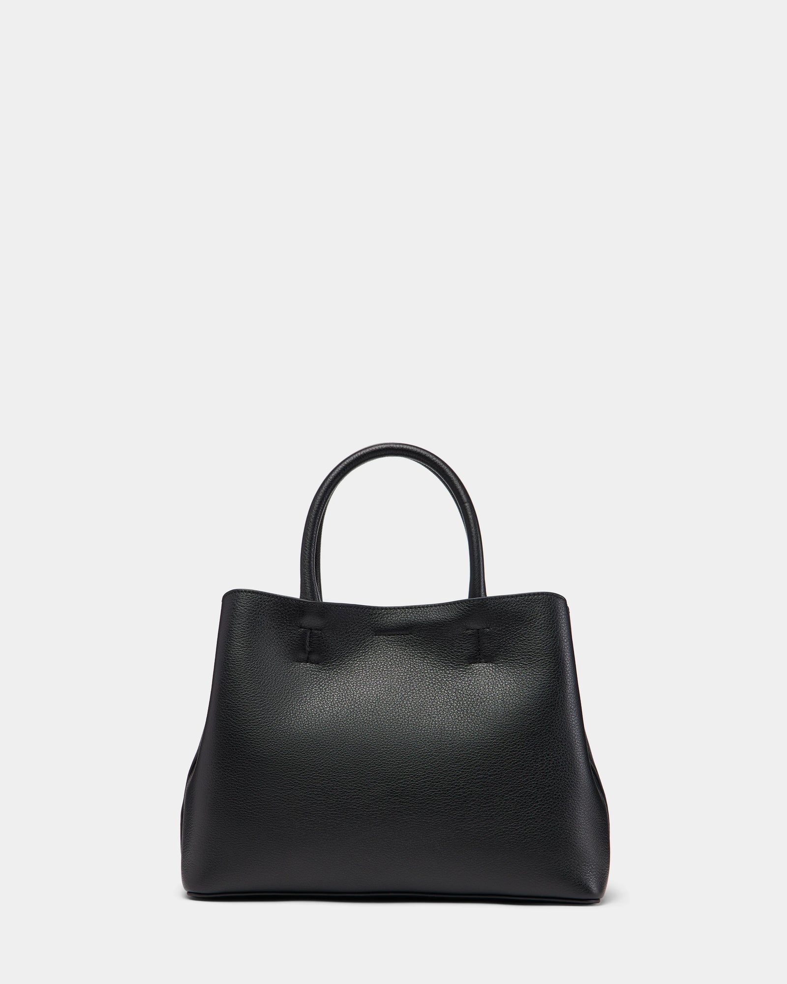 The Rudsak CATIRA S - 8325006 Black is a women’s leather tote with two rounded handles, pebbled texture, structured design, and a removable shoulder strap, displayed against a plain white background.