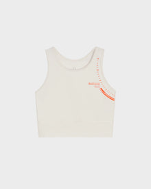 The TRACY - 8524016 Eggshell by Rudsak is a white racer-back sports bra with red writing, ideal for women who want high-performance and style.