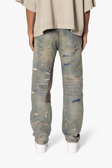 V613 Distressed Saddle Denim | Blue