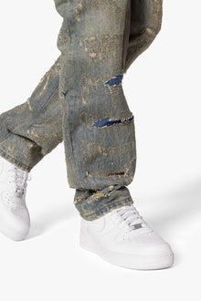 V613 Distressed Saddle Denim | Blue