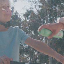 Green bottle of Mosolar Sciences Kidspray