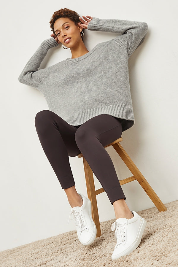 Front image of a woman standing wearing the Harrington Legging—Light Scuba in Haze | Grid Hover | Exclude
