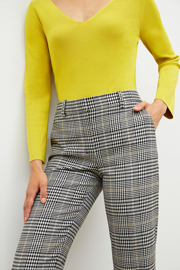 Front image of a woman wearing the kara top in chartreuse | Exclude